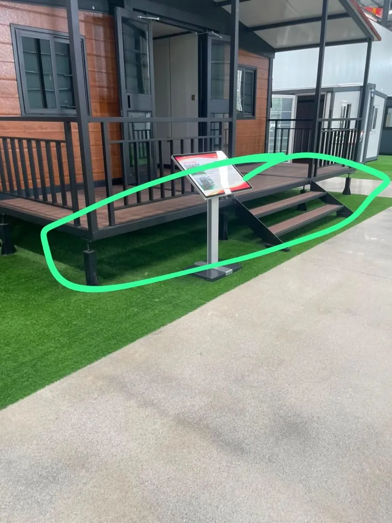 The showroom expandable house with its terrace and entry steps circled in green marker